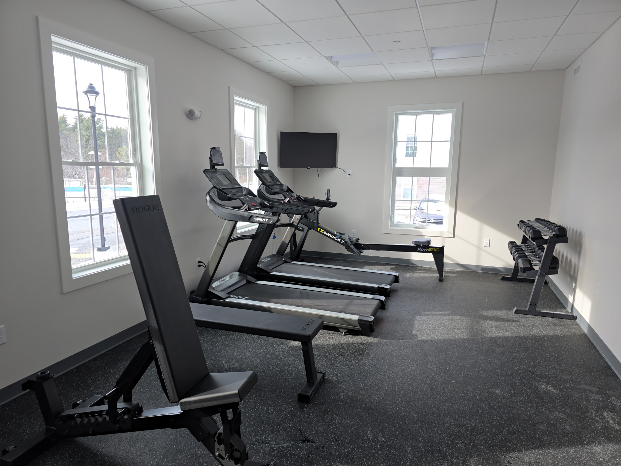 Multi-family fitness center buildout, commercial gym equipment installation New England